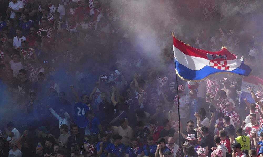 Croatia fans cheer during a Group B match between Croatia and Albania at the Euro 2024 soccer tournament in Hamburg, Germany, Wednesday, June 19, 2024. (AP Photo/Sunday Alamba)