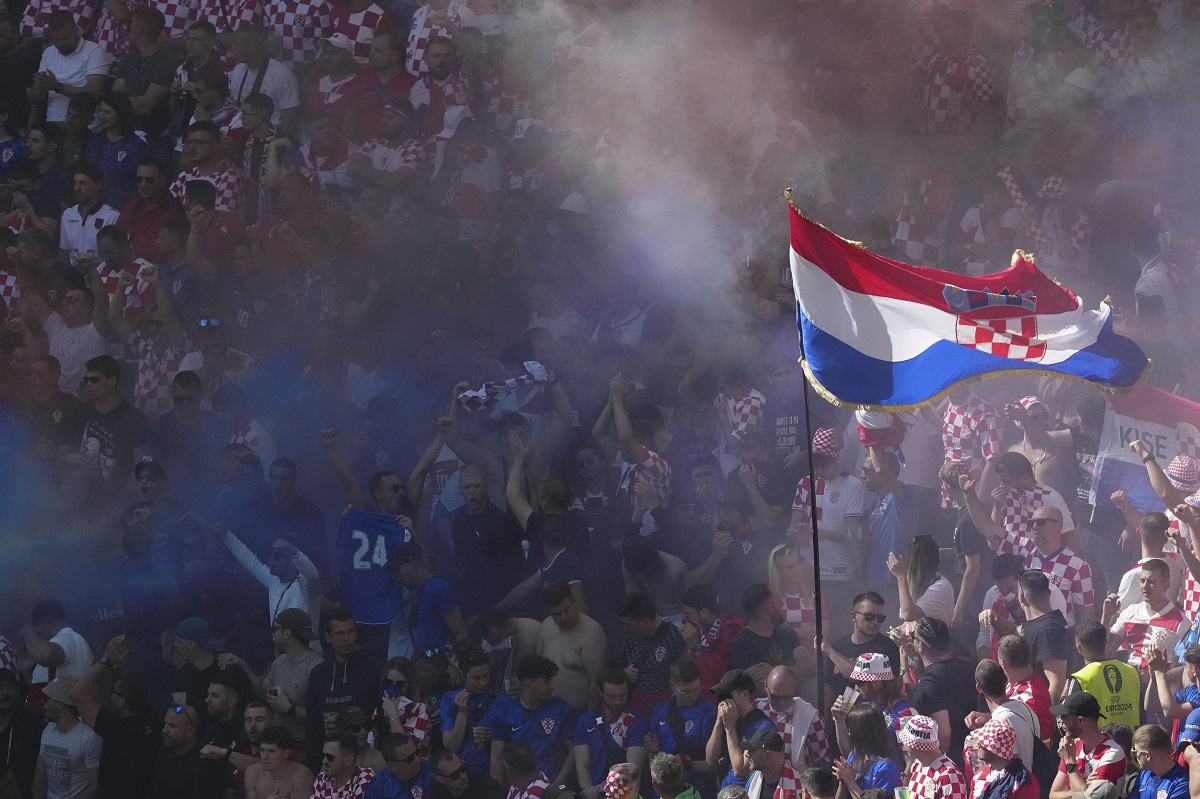 Croatia fans cheer during a Group B match between Croatia and Albania at the Euro 2024 soccer tournament in Hamburg, Germany, Wednesday, June 19, 2024. (AP Photo/Sunday Alamba)