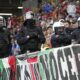 Police officers go into the crowd before the start of the Group B match between Italy and Albania at the Euro 2024 soccer tournament in Dortmund, Germany, Saturday, June 15, 2024. (AP Photo/Martin Meissner)
