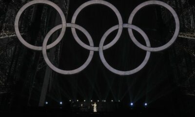 Celine Dion performs on the Eiffel Tower in Paris, France, during the opening ceremony of the 2024 Summer Olympics, Friday, July 26, 2024. (AP Photo/Natacha Pisarenko)