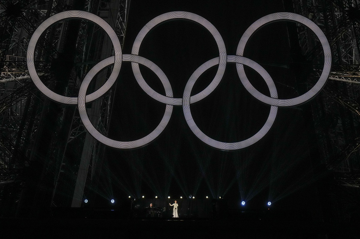 Celine Dion performs on the Eiffel Tower in Paris, France, during the opening ceremony of the 2024 Summer Olympics, Friday, July 26, 2024. (AP Photo/Natacha Pisarenko)