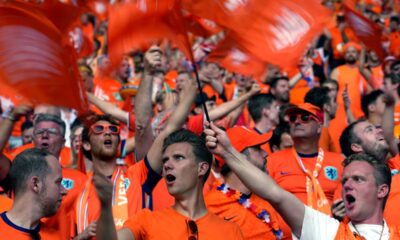 Fans cheer their Netherlands team prior a quarterfinal match between the Netherlands and Turkey at the Euro 2024 soccer tournament in Berlin, Germany, Saturday, July 6, 2024. (AP Photo/Ebrahim Noroozi)