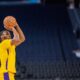 Los Angeles Lakers guard Bronny James warms up before an NBA summer league basketball game against the Sacramento Kings in San Francisco , Saturday, July 6, 2024. (AP Photo/Nic Coury)
