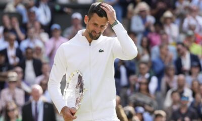 Novak Djokovic of Serbia reacts after losing to Carlos Alcaraz of Spain in the men's singles final at the Wimbledon tennis championships in London, Sunday, July 14, 2024. (AP Photo/Kirsty Wigglesworth)