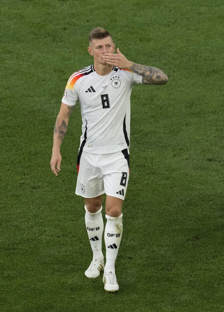 Germany's Toni Kroos blows a kiss at the end of a quarter final match between Germany and Spain at the Euro 2024 soccer tournament in Stuttgart, Germany, Friday, July 5, 2024. Spain won the team 2-1. (AP Photo/Michael Probst)