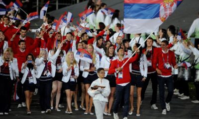 U Rio de Žaneiru 2016. godine zastavu je nosila Ivana Anđušić Maksimović, srebrna strelkinja iz Londona 2012. godine. Na Igrama u Londonu 2012. godine, zastavu je nosio najbolji teniser sveta Novak Đoković, dok je na OI u Pekingu 2008. godine ta čast pripala strelkinji Jasni Šekarić, petostrukoj osvajačici medalja za Srbiju.