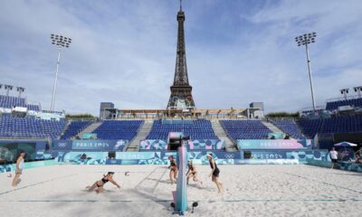 Spain's Liliana Fernandez Steiner returns a shot during a women's beach volleyball practice match with Switzerland at the Eiffel Tower Stadium, during the 2024 Summer Olympics, Thursday, July 25, 2024, in Paris, France. (AP Photo/Robert F. Bukaty)