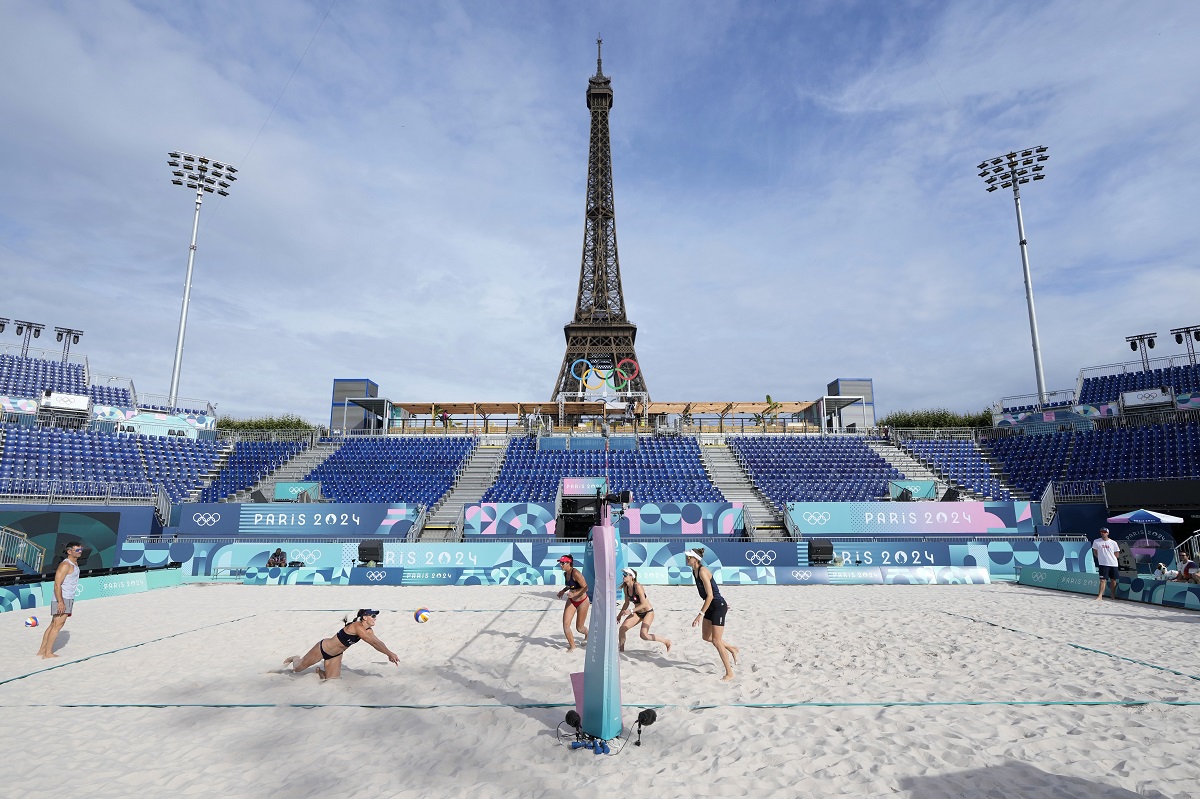 Spain's Liliana Fernandez Steiner returns a shot during a women's beach volleyball practice match with Switzerland at the Eiffel Tower Stadium, during the 2024 Summer Olympics, Thursday, July 25, 2024, in Paris, France. (AP Photo/Robert F. Bukaty)