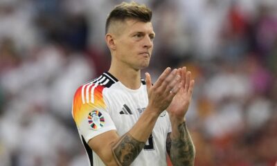 Germany's Toni Kroos clap hands as he acknowledges supporters at the end of a quarter final match between Germany and Spain at the Euro 2024 soccer tournament in Stuttgart, Germany, Friday, July 5, 2024. (AP Photo/Ariel Schalit)