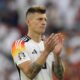 Germany's Toni Kroos clap hands as he acknowledges supporters at the end of a quarter final match between Germany and Spain at the Euro 2024 soccer tournament in Stuttgart, Germany, Friday, July 5, 2024. (AP Photo/Ariel Schalit)