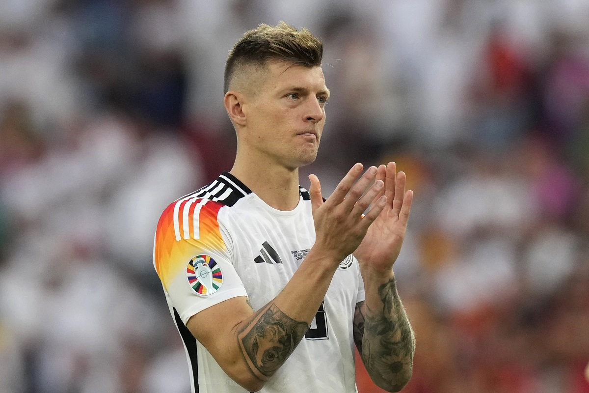 Germany's Toni Kroos clap hands as he acknowledges supporters at the end of a quarter final match between Germany and Spain at the Euro 2024 soccer tournament in Stuttgart, Germany, Friday, July 5, 2024. (AP Photo/Ariel Schalit)