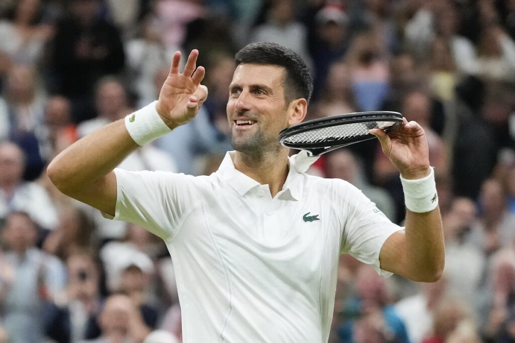 Novak Djokovic of Serbia reacts after defeating Alexei Popyrin of Australia in their third round match at the Wimbledon tennis championships in London, Saturday, July 6, 2024. (AP Photo/Kirsty Wigglesworth)