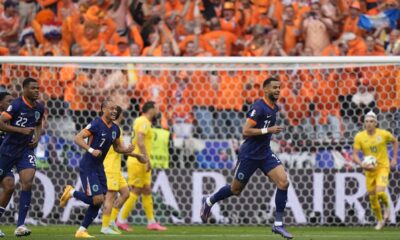 Cody Gakpo of the Netherlands celebrates scoring his side's opening goal during a round of sixteen match between Romania and the Netherlands at the Euro 2024 soccer tournament in Munich, Germany, Tuesday, July 2, 2024. (AP Photo/Matthias Schrader)