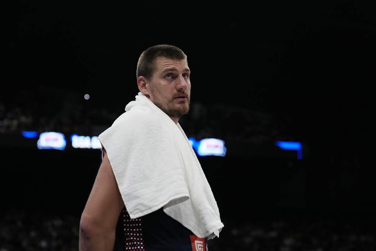 Serbia's Nikola Jokic reacts after Serbia lost an exhibition basketball match against the United States at the USA Basketball Showcase, ahead of the 2024 Paris Olympic basketball tournament, in Abu Dhabi, United Arab Emirates, Wednesday, July 17, 2024. (AP Photo/Altaf Qadri)