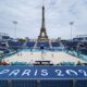 Players from the Netherlands, left, and Switzerland, practice beach volleyball at the 2024 Summer Olympics, Thursday, July 25, 2024, in Paris, France. (AP Photo/Robert F. Bukaty)