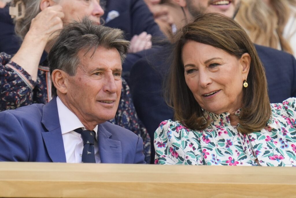Sebastian Coe and Carole Middleton talk ahead of the second round match between Serbia's Novak Djokovic and Britain's Jacob Fearnley on Centre Court at the Wimbledon tennis championships in London, Thursday, July 4, 2024. (AP Photo/Kirsty Wigglesworth)