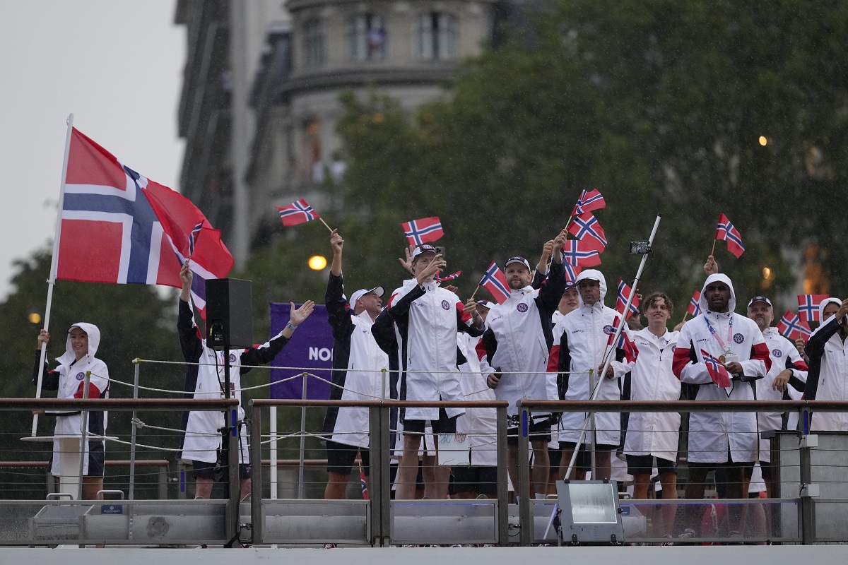 Norway team parades along the Seine river in Paris, France, during the opening ceremony of the 2024 Summer Olympics, Friday, July 26, 2024.. (AP Photo/Luca Bruno)