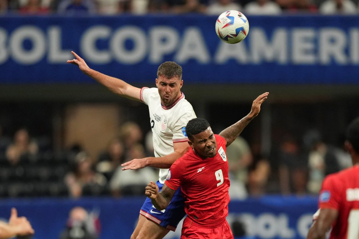 Joe Scally of the United States, top, and Panama's Eduardo Guerrero vie for the ball during a Copa America Group C soccer match in Atlanta, Thursday, June 27, 2024. (AP Photo/Jason Allen)