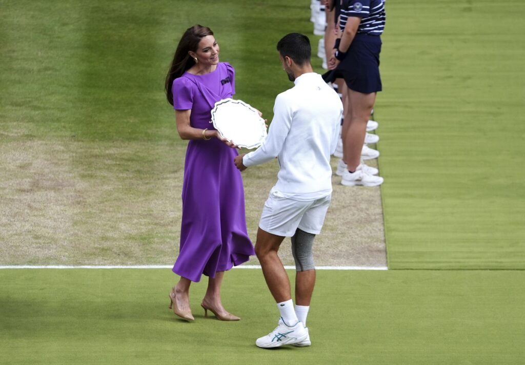 The Princess of Wales presents Novak Djokovic with his runners up plate following defeat the men's singles final at the Wimbledon tennis championships in, Sunday, July 14, 2024. (John Walton/PA via AP)