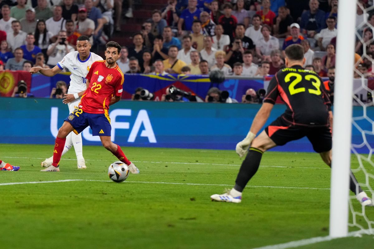 Kylian Mbappe of France makes an attempt to score during a semifinal match between Spain and France at the Euro 2024 soccer tournament in Munich, Germany, Tuesday, July 9, 2024. (AP Photo/Manu Fernandez)