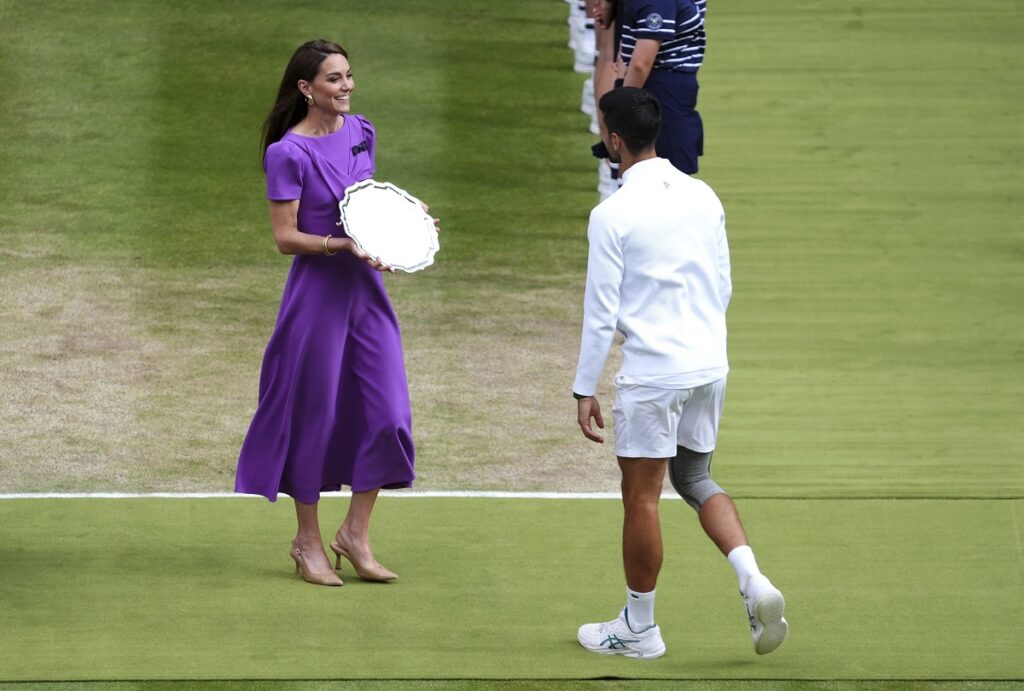 The Princess of Wales presents Novak Djokovic with his runners up plate following defeat the men's singles final at the Wimbledon tennis championships in, Sunday, July 14, 2024. (John Walton/PA via AP)