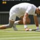 Serbia's Novak Djokovic falls during his second round match against Britain's Jacob Fearnley at the Wimbledon tennis championships in London, Thursday, July 4, 2024. (AP Photo/Kirsty Wigglesworth)