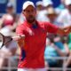 Serbia's Novak Djokovic returns the ball to Spain's Rafael Nadal during their men's singles second round match at the 2024 Summer Olympics, Monday, July 29, 2024, at the Roland Garros stadium in Paris, France. (AP Photo/Andy Wong)