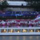 Serbia team parades along the Seine river in Paris, France, during the opening ceremony of the 2024 Summer Olympics, Friday, July 26, 2024. (AP Photo/Charlie Riedel)