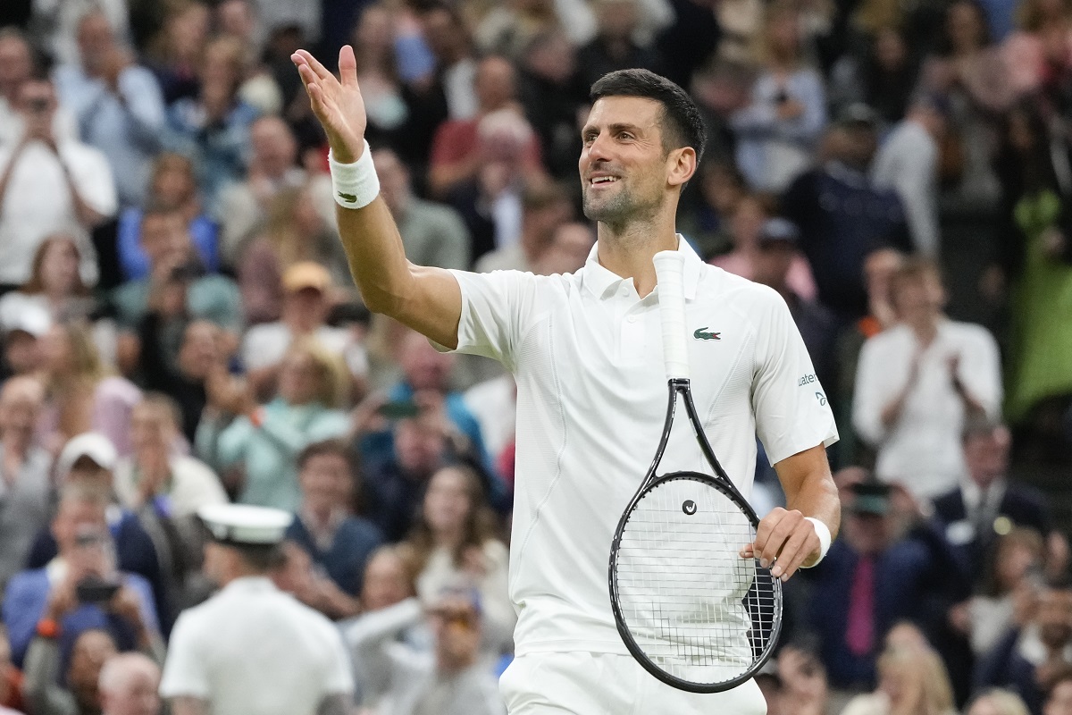 Novak Djokovic of Serbia reacts after defeating Alexei Popyrin of Australia in their third round match at the Wimbledon tennis championships in London, Saturday, July 6, 2024. (AP Photo/Kirsty Wigglesworth)