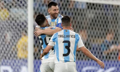 Argentina's Lionel Messi is congratulated after scoring his side's second goal against Canada during a Copa America semifinal soccer match in East Rutherford, N.J., Tuesday, July 9, 2024. (AP Photo/Adam Hunger)