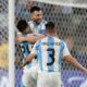 Argentina's Lionel Messi is congratulated after scoring his side's second goal against Canada during a Copa America semifinal soccer match in East Rutherford, N.J., Tuesday, July 9, 2024. (AP Photo/Adam Hunger)