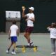 Serbia's Novak Djokovic plays a game of Spike Ball with his children before training, at the Wimbledon tennis championships in London, Saturday, July 13, 2024. (Aaron Chown/PA via AP)