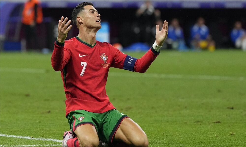 Portugal's Cristiano Ronaldo reacts after missing a chance to score a goal against Slovenia during a round of sixteen match at the Euro 2024 soccer tournament in Frankfurt, Germany, Monday, July 1, 2024. (AP Photo/Antonio Calanni)
