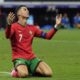 Portugal's Cristiano Ronaldo reacts after missing a chance to score a goal against Slovenia during a round of sixteen match at the Euro 2024 soccer tournament in Frankfurt, Germany, Monday, July 1, 2024. (AP Photo/Antonio Calanni)