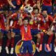 Spain's Alvaro Morata lifts the trophy after winning the final match between Spain and England at the Euro 2024 soccer tournament in Berlin, Germany, Sunday, July 14, 2024. (AP Photo/Andreea Alexandru)