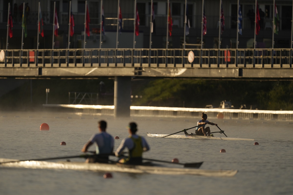 Athletes train ahead of the day's rowing competitions at the 2024 Summer Olympics, Sunday, July 28, 2024, in Vaires-sur-Marne, France. (AP Photo/Lindsey Wasson)