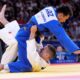 Serbia's Strahinja Buncic and Kazakhstan's Gusman Kyrgyzbayev compete during their men -66 kg bronze medal final match in team judo competition at Champ-de-Mars Arena during the 2024 Summer Olympics, Sunday, July 28, 2024, in Paris, France. (AP Photo/Eugene Hoshiko)