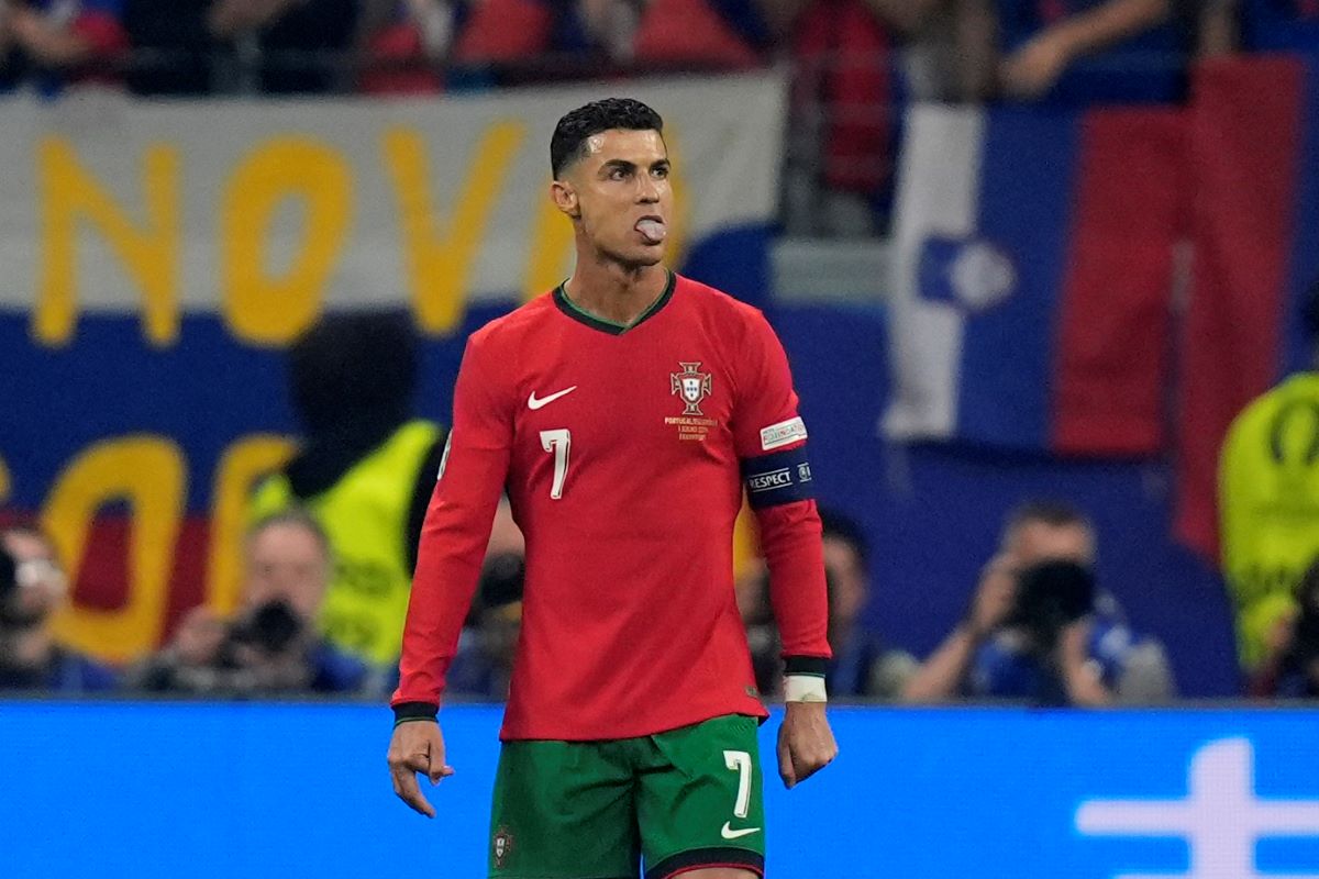 Portugal's Cristiano Ronaldo reacts during a round of sixteen match between Portugal and Slovenia at the Euro 2024 soccer tournament in Frankfurt, Germany, Monday, July 1, 2024. (AP Photo/Matthias Schrader)