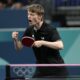 Denmark's Anders Lind reacts after a winning point against Portugal's Marcos Freitas during a men's singles round of 64 table tennis game at the 2024 Summer Olympics, Monday, July 29, 2024, in Paris, France. (AP Photo/Petros Giannakouris)