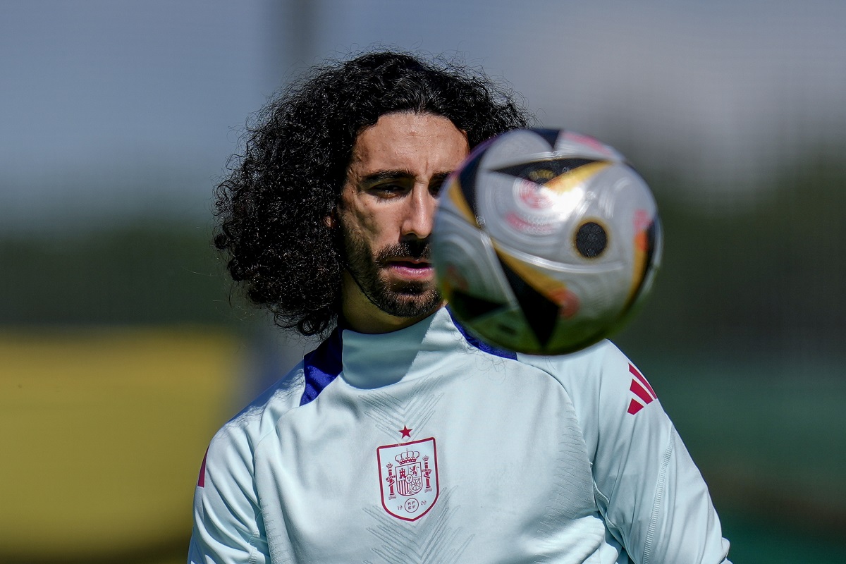 Spain's Marc Cucurella eyes the ball during a training session ahead of Tuesday's Euro 2024, semifinal soccer match against France in Donaueschingen, Germany, Monday, July 8, 2024. (AP Photo/Manu Fernandez)