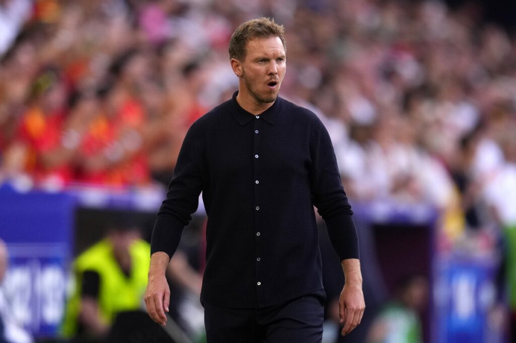 Germany's head coach Julian Nagelsmann grimaces during a quarter final match between Germany and Spain at the Euro 2024 soccer tournament in Stuttgart, Germany, Friday, July 5, 2024. (AP Photo/Manu Fernandez)