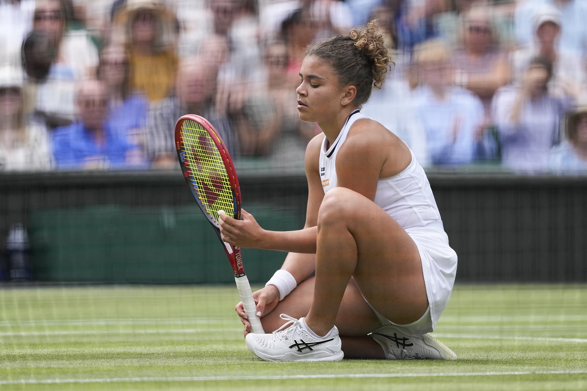 Jasmine Paolini of Italy reacts during her semifinal match against Donna Vekic of Croatia at the Wimbledon tennis championships in London, Thursday, July 11, 2024. (AP Photo/Alberto Pezzali)