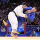 Azerbaijan's Yashar Najafov and Serbia's Strahinja Buncic, right, compete during their men -66 kg elimination round match in team judo competition at Champ-de-Mars Arena during the 2024 Summer Olympics, Sunday, July 28, 2024, in Paris, France. (AP Photo/Eugene Hoshiko)