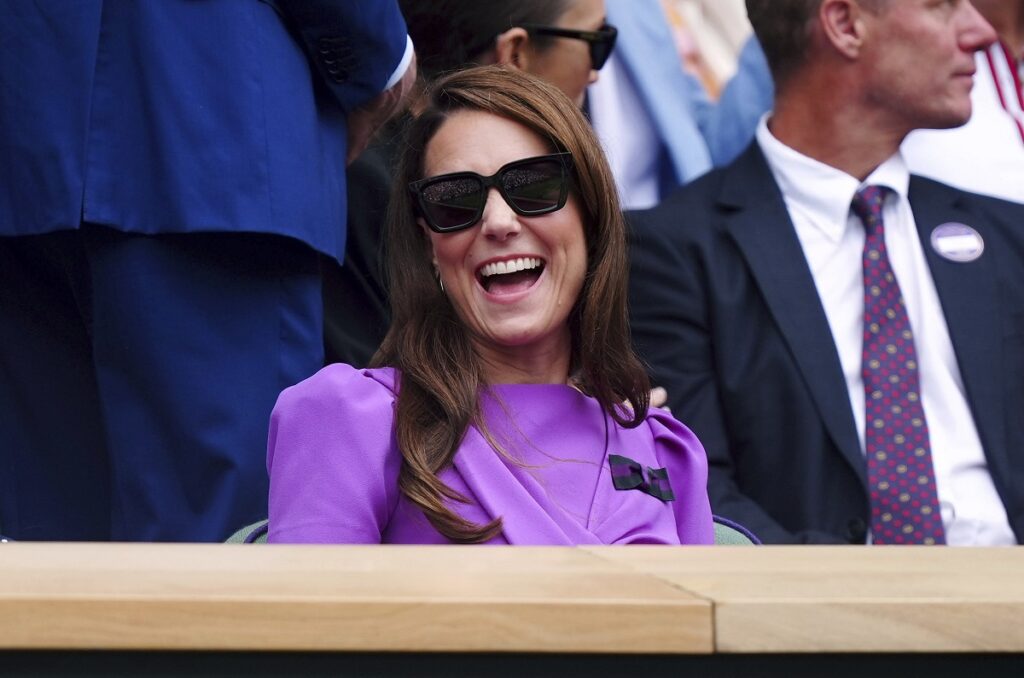 Britain's Kate, the Princess of Wales reacts as she sits in the royal box to watch the men's singles final between Carlos Alcaraz of Spain and Novak Djokovic of Serbia, at the Wimbledon tennis championships in London, Sunday, July 14, 2024. (Mike Egerton/PA via AP)