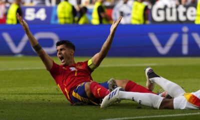 Spain's Alvaro Morata gestures during a quarter final match between Germany and Spain at the Euro 2024 soccer tournament in Stuttgart, Germany, Friday, July 5, 2024. (AP Photo/Manu Fernandez)