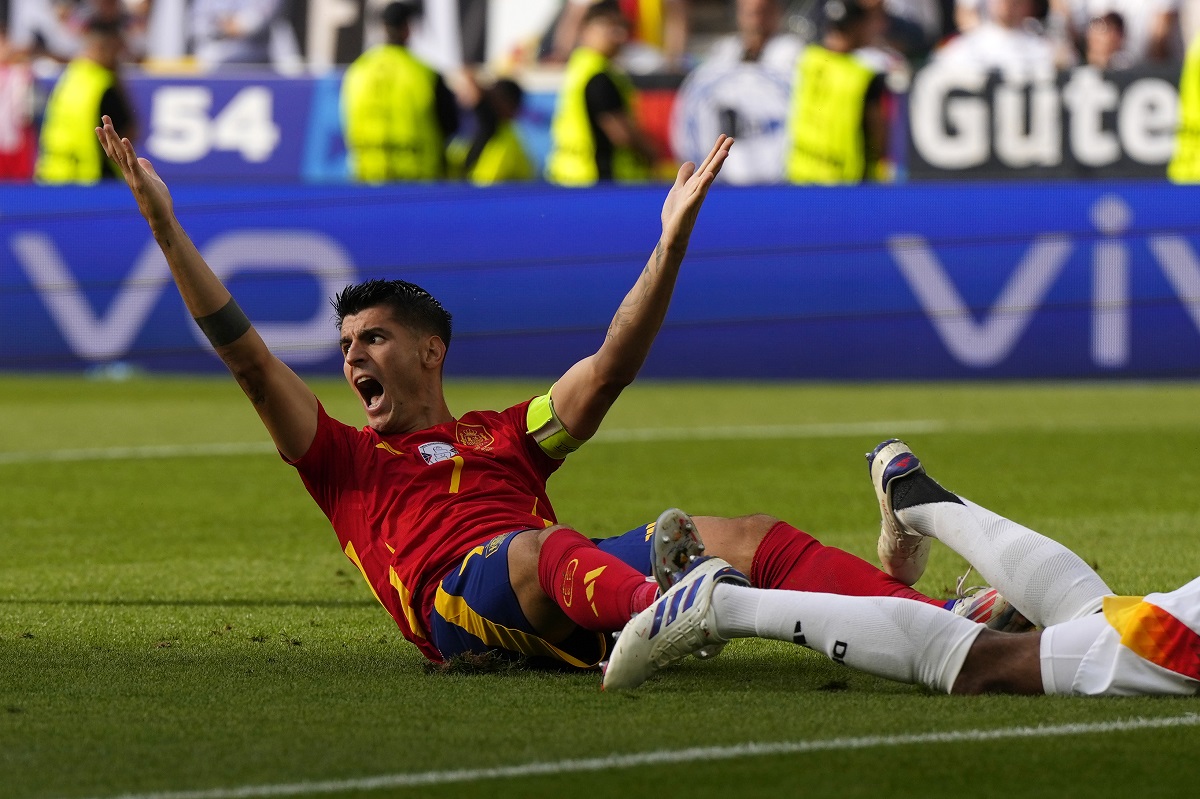 Spain's Alvaro Morata gestures during a quarter final match between Germany and Spain at the Euro 2024 soccer tournament in Stuttgart, Germany, Friday, July 5, 2024. (AP Photo/Manu Fernandez)