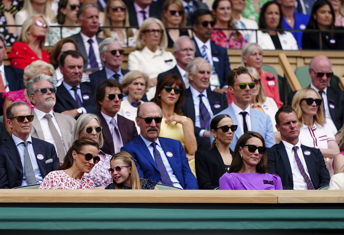 Britain's Kate, the Princess of Wales, her sister Pippa, left and Princess Charlotte sit in the royal box to watch the men's singles final between Carlos Alcaraz of Spain and Novak Djokovic of Serbia, at the Wimbledon tennis championships in London, Sunday, July 14, 2024. (Mike Egerton/PA via AP)