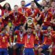 Spain's Alvaro Morata holds the trophy as he celebrates with his teammates after winning the final match between Spain and England at the Euro 2024 soccer tournament in Berlin, Germany, Sunday, July 14, 2024. Spain won 2-1. (AP Photo/Frank Augstein)