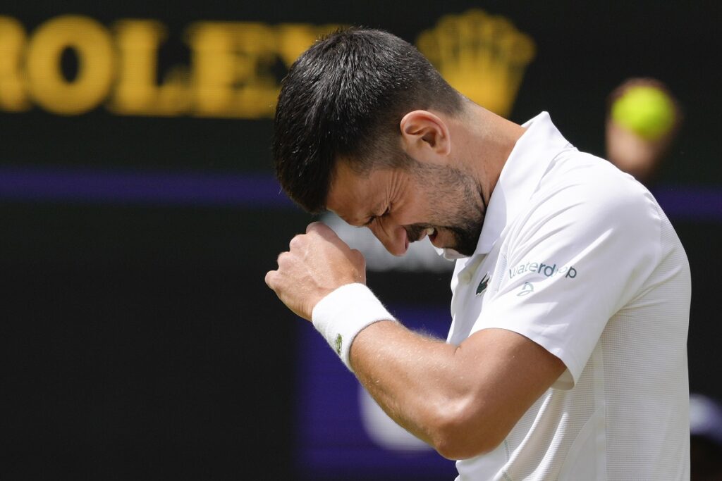 Serbia's Novak Djokovic reacts during his second round match against Britain's Jacob Fearnley at the Wimbledon tennis championships in London, Thursday, July 4, 2024. (AP Photo/Kirsty Wigglesworth)