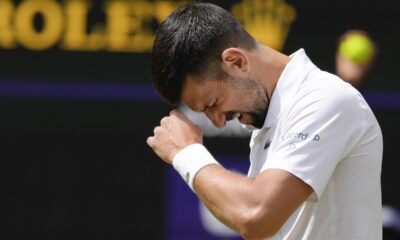 Serbia's Novak Djokovic reacts during his second round match against Britain's Jacob Fearnley at the Wimbledon tennis championships in London, Thursday, July 4, 2024. (AP Photo/Kirsty Wigglesworth)